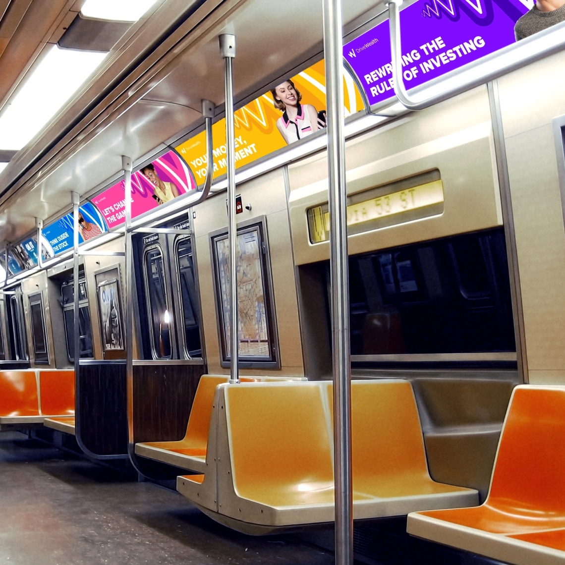 billboards on a train showing examples of advertisements developed for DriveWealth