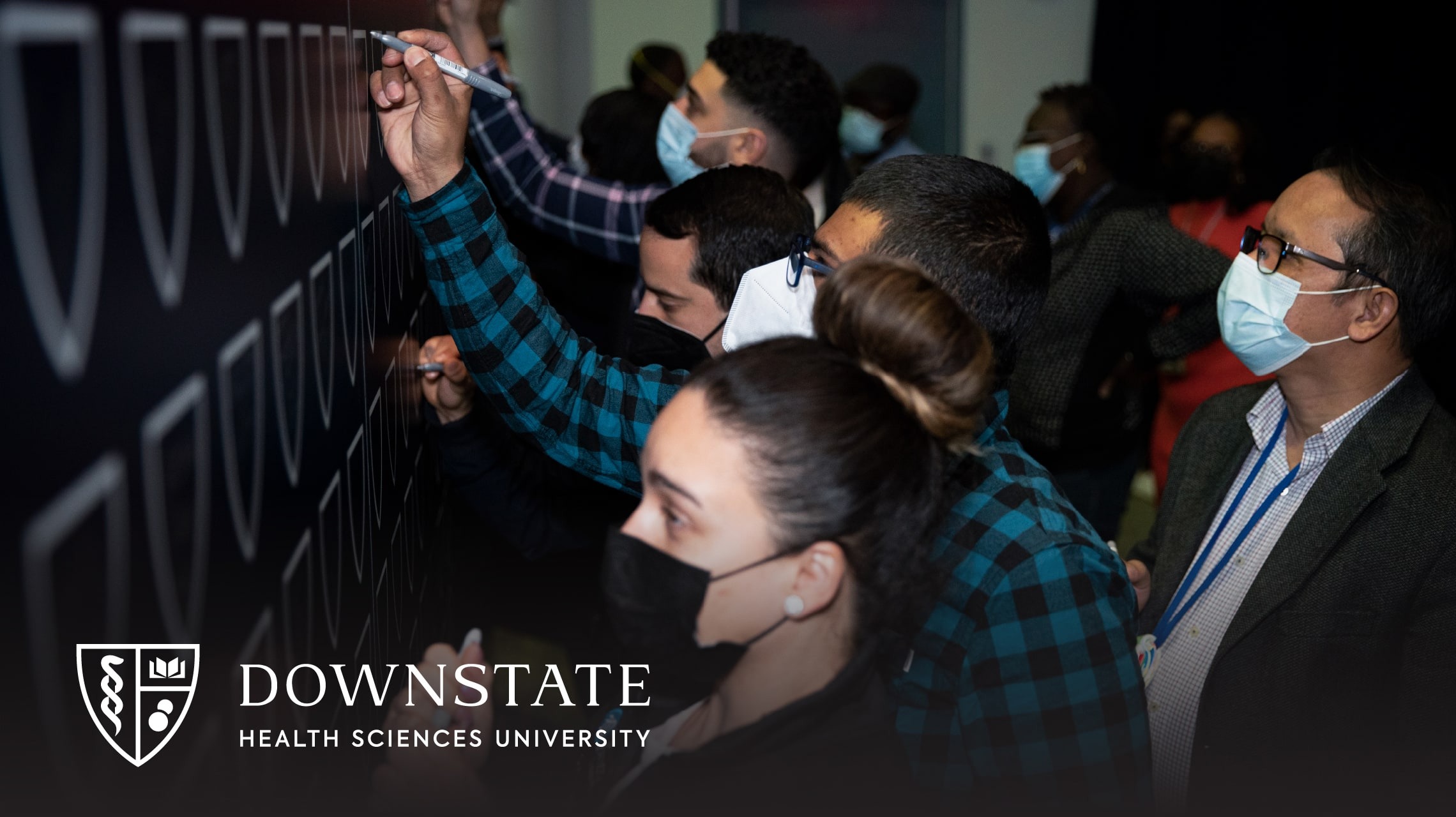 A group of college students during the "School Pride" launch week of the new brand for SUNY