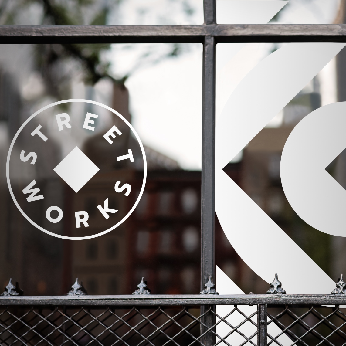 The Logo and graphic motif applied to a window