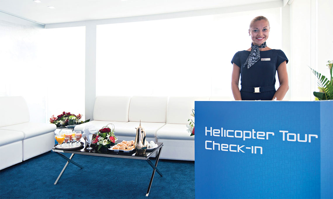 A woman at a check-in booth.