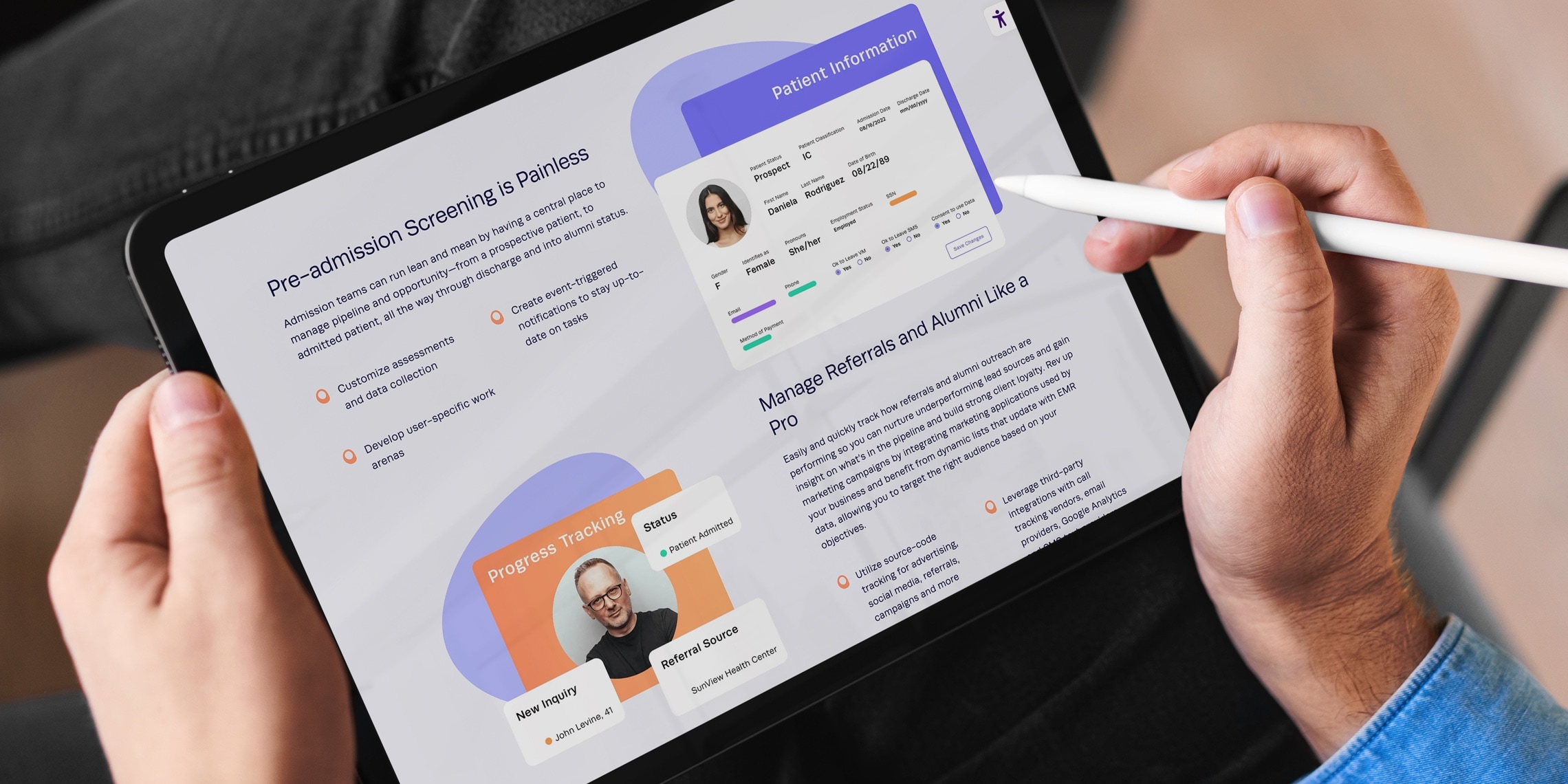 A person points to a tablet screen showing part of the multimedia designs developed for Kypu.