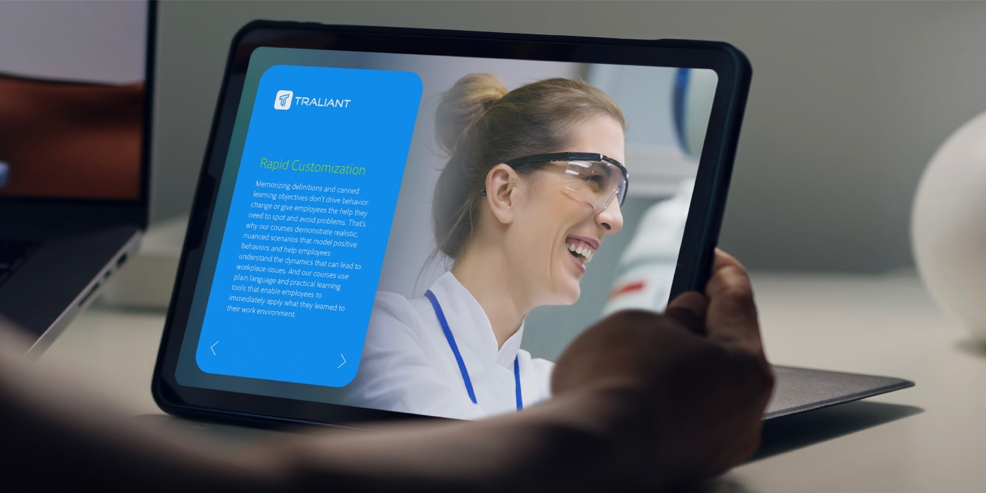 A tablet with a digital presentation developed for Traliant
